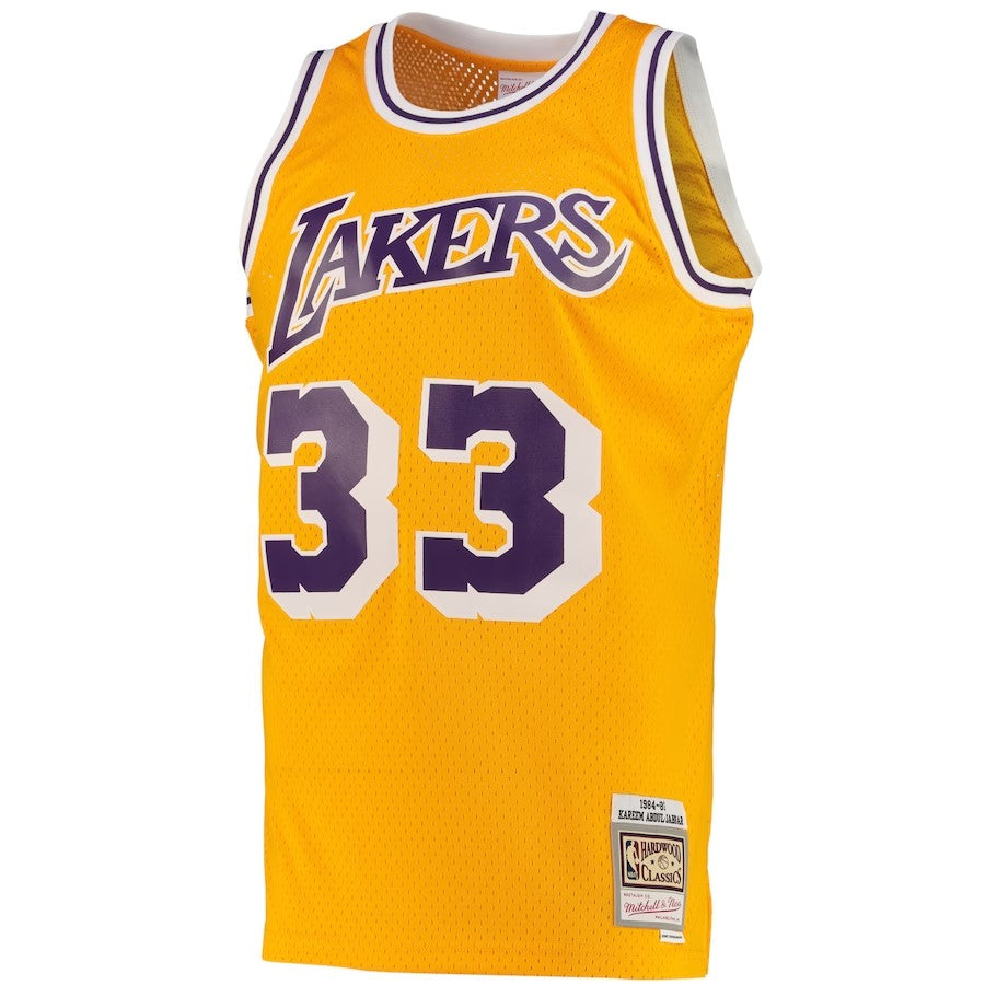 Los Angeles Lakers Mitchell & Ness Kareem Abdul-Jabbar #33 Road Swingman Jersey 1984-85 - Light Gold