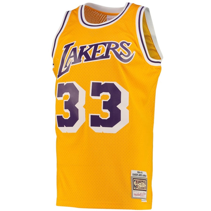 Los Angeles Lakers Mitchell & Ness Kareem Abdul-Jabbar #33 Road Swingman Jersey 1984-85 - Light Gold