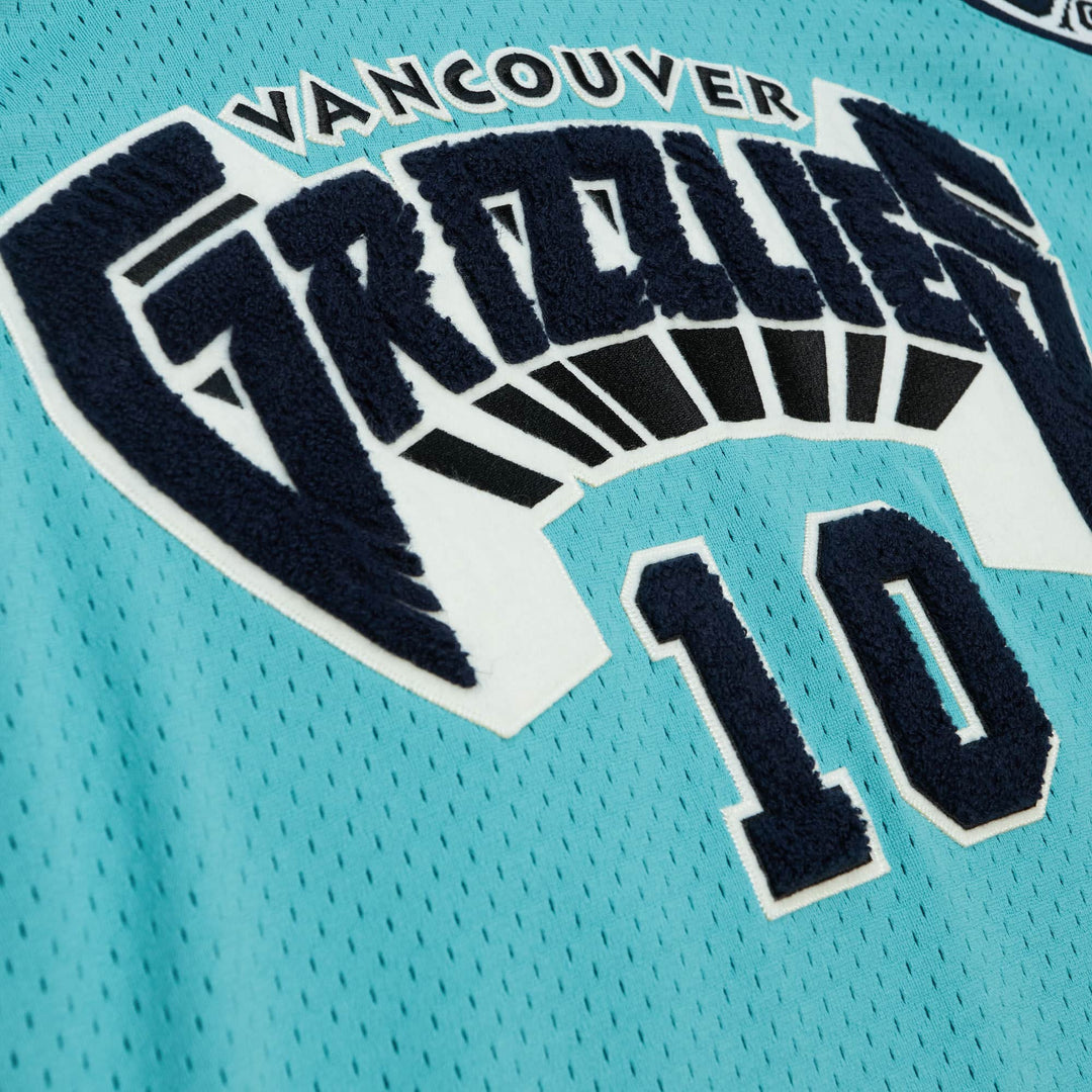 Vancouver Grizzlies Mitchell & Ness Mike Bibby #10 Teal Hardwood Classics Off-Court Swingman Jersey