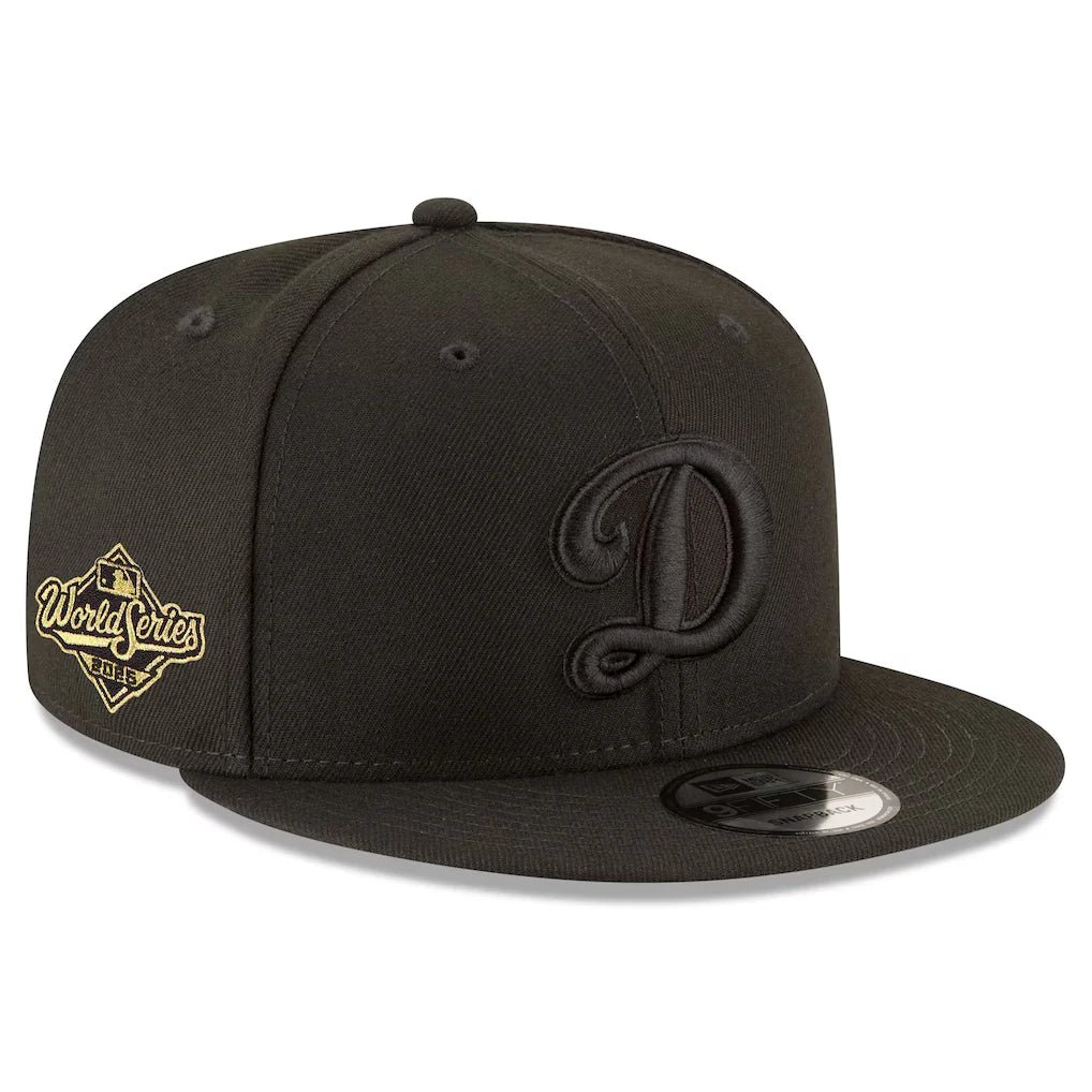 Los Angeles Dodgers New Era 2025 World Series Champions Side Patch 9FIFTY Snapback Hat - Black/Black Gold